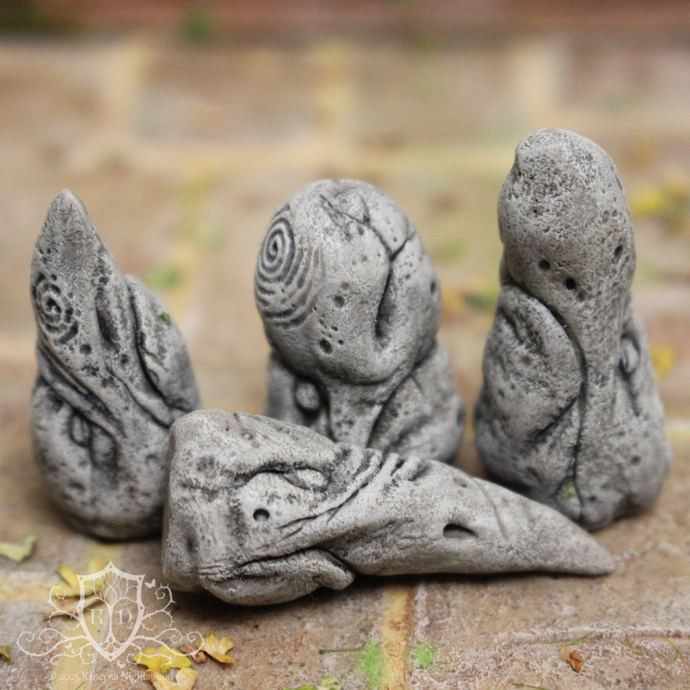 Standing Stone Troll heads